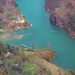 Aerial view of Nho Que River winding through Hà Giang's lush valleys.